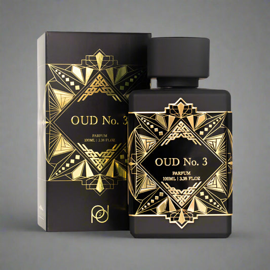 Black and gold OUD No. 3 perfume bottle and packaging on a gray background